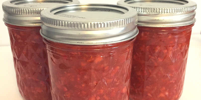 three jars of strawberry rhubarb freezer jam